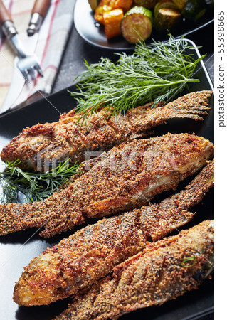 close-up of freshly fried crispy crucian carps 55398665
