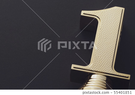 Golden statue award for winning first place 55401851