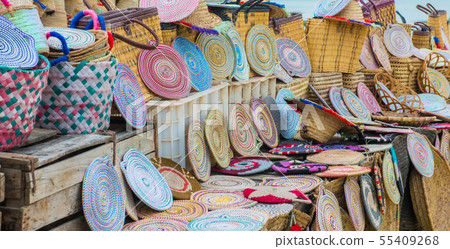 Craft wicker hats, bags and other souvenirs in Morocco market 55409268
