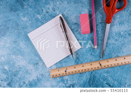 Assortment of school supplies. Ruler, scissors, Assortment of school supplies. Ruler, scissors, 55410115