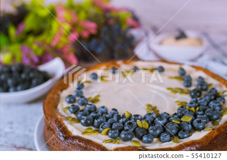 Cheesecake with blueberry, pumpkin seeds and cream 55410127