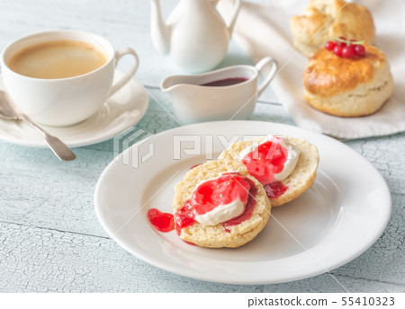 Classic scones with cream and berry jam Classic scones with cream and berry jam 55410323