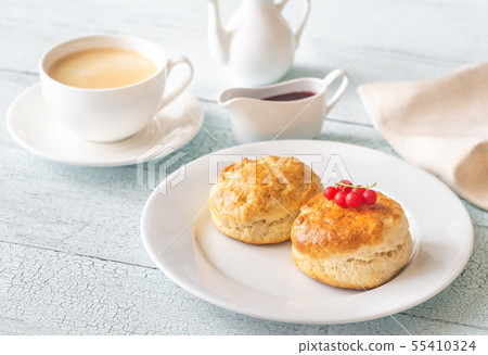 Classic scones with cream and berry jam 55410324