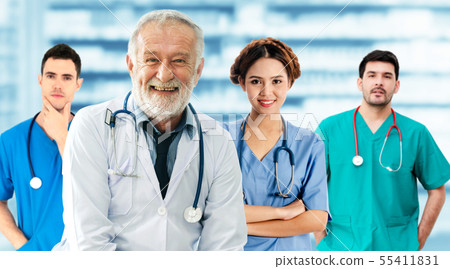 Doctor working in hospital with other doctors. Doctor working in hospital with other doctors. 55411831