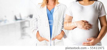 Pregnant Woman and Gynecologist Doctor at Hospital Pregnant Woman and Gynecologist Doctor at Hospital 55411971