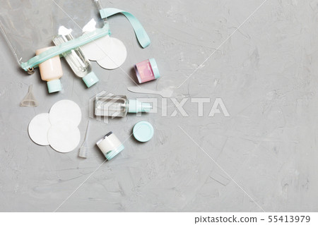 Group of small bottles for travelling on gray Group of small bottles for travelling on gray 55413979