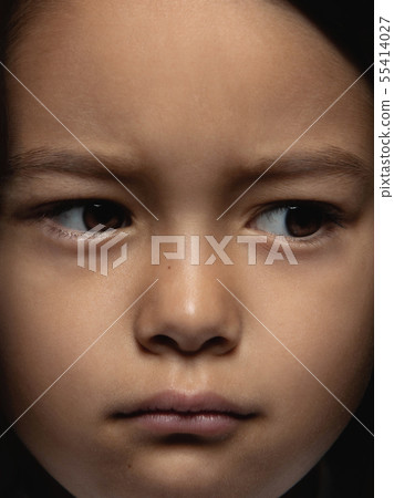 Close up portrait of a little emotional girl 55414027