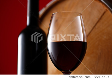Red wine and wine barrel 55414403
