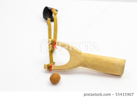 Handmade slingshot catapult. Y-shaped wooden stick Handmade slingshot catapult. Y-shaped wooden stick 55415907