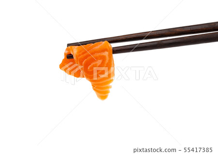 Salmon raw sashimi with chopsticks on a white 55417385