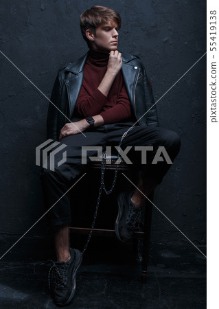 Young charming man with a hairstyle 55419138