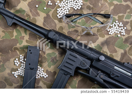 air soft machine gun with protective glasses and air soft machine gun with protective glasses and 55419439