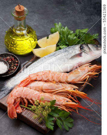 Fresh seafood. Trout fish and langostino shrimps Fresh seafood. Trout fish and langostino shrimps 55421369