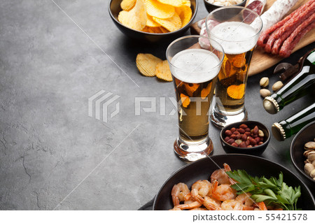 Draft beer and snacks 55421578
