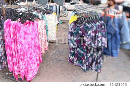 shop clothes for sales at market 55425953