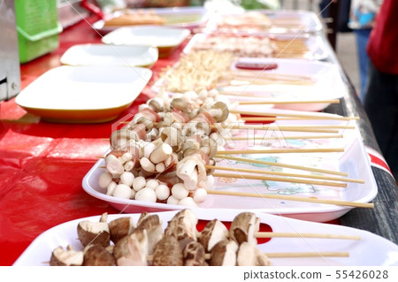 Bacon roll with mushroom at street food 55426028