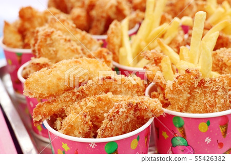French fries and fried chicken at market 55426382