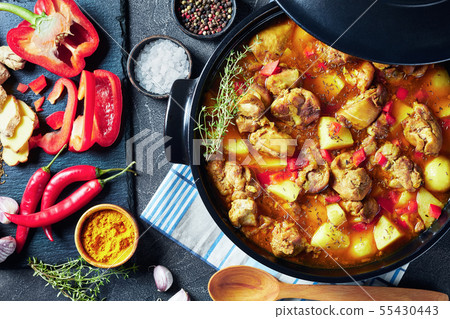 hot chicken curry with potato, flat lay 55430443