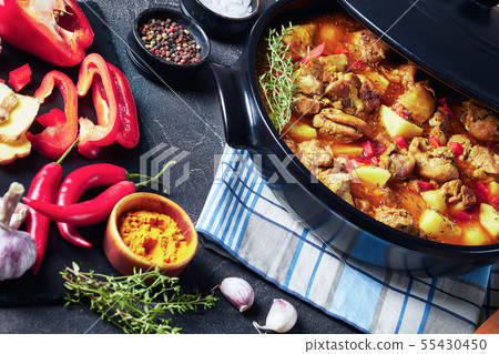 spicy chicken boneless thighs curry in a pan spicy chicken boneless thighs curry in a pan 55430450