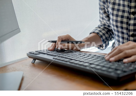 Programmer working in a software development and Programmer working in a software development and 55432206