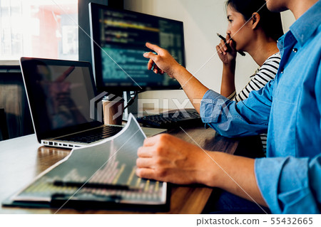 Programmer working in a software development and 55432665