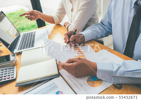 Business advisor analyzing financial figures 55432671