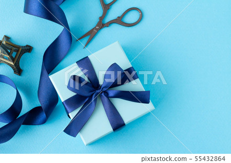 Image of blue ribbon present 55432864