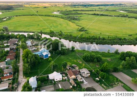 Golovintsy, Gomel Region, Belarus. Aerial View OF Village With Old Wooden Orthodox Church Of The Golovintsy, Gomel Region, Belarus. Aerial View OF Village With Old Wooden Orthodox Church Of The 55433089
