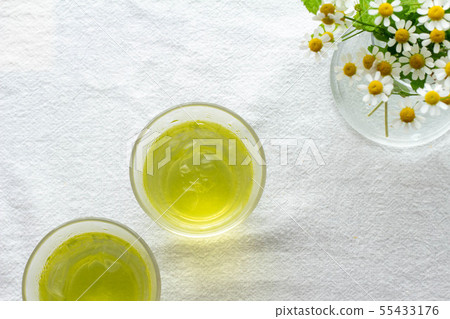 Cold green tea in a glass Cold green tea in a glass 55433176