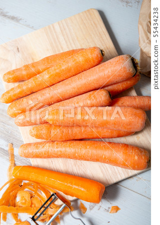 beautiful garden carrots ready to peeling 55434238