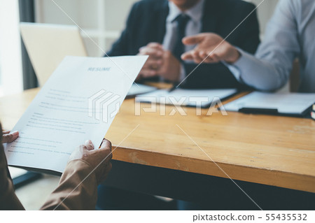 Attractive young business woman in a job interview 55435532