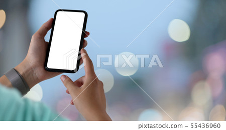Young man with blank screen smartphone Young man with blank screen smartphone 55436960