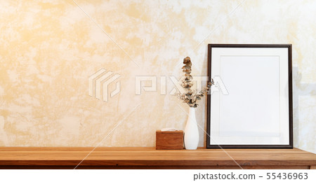 Mock up poster frame on wood table workspace and Mock up poster frame on wood table workspace and 55436963