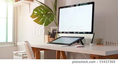 Artist workplace with computer 55437360