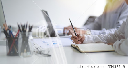 Young professional business team working Young professional business team working 55437549