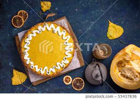 Spicy delicious round pumpkin pie decorated with Spicy delicious round pumpkin pie decorated with 55437636