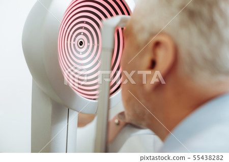 Modern equipment for eye sight analysis standing in light room Modern equipment for eye sight analysis standing in light room 55438282