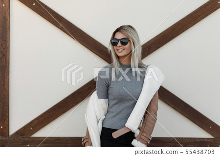 Young attractive smiling hipster woman Young attractive smiling hipster woman 55438703