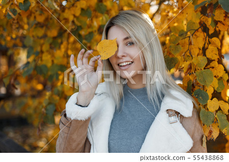 Young beautiful happy woman with a smile 55438868