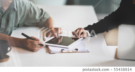 Business people brainstorming the investment Business people brainstorming the investment 55438914