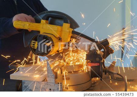 Craftsman sawing metal with disk grinder in 55439473