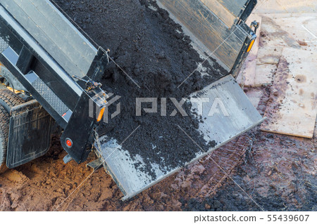 Construction. To unload a truck dump truck 55439607