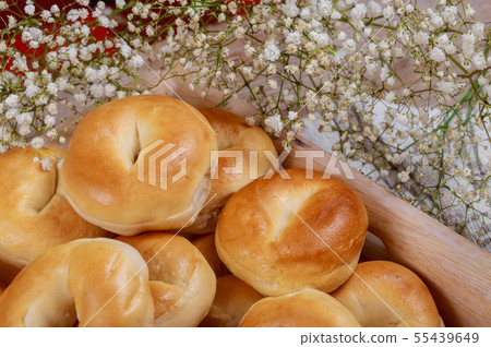 Homemade buns in bowl vintage wooden background, Homemade buns in bowl vintage wooden background, 55439649