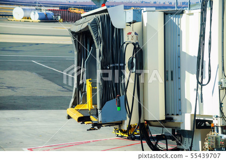 Empty gate and jetway at airport terminal Empty gate and jetway at airport terminal 55439707
