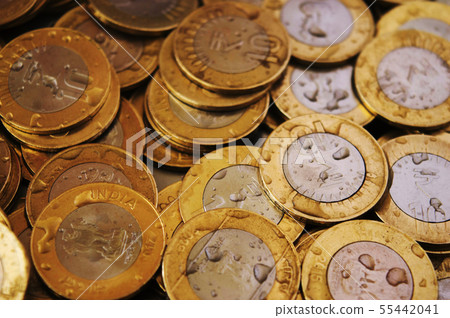 10 rupee coins with water drops 55442041