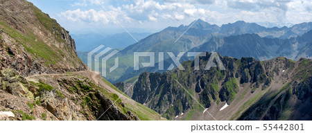 view of Pyrenees mountains with cloudy  blue sky 55442801