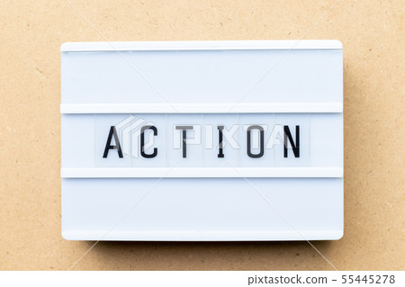 White lightbox with word action on wood background White lightbox with word action on wood background 55445278