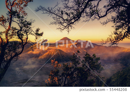 Aerial view of Mount Bromo at sunrise. An active Aerial view of Mount Bromo at sunrise. An active 55448208