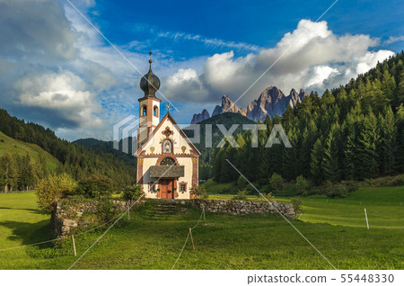 St. John church in front of the Odle mountains St. John church in front of the Odle mountains 55448330