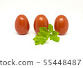 Red tomatoes on white background. Green parsley 55448487